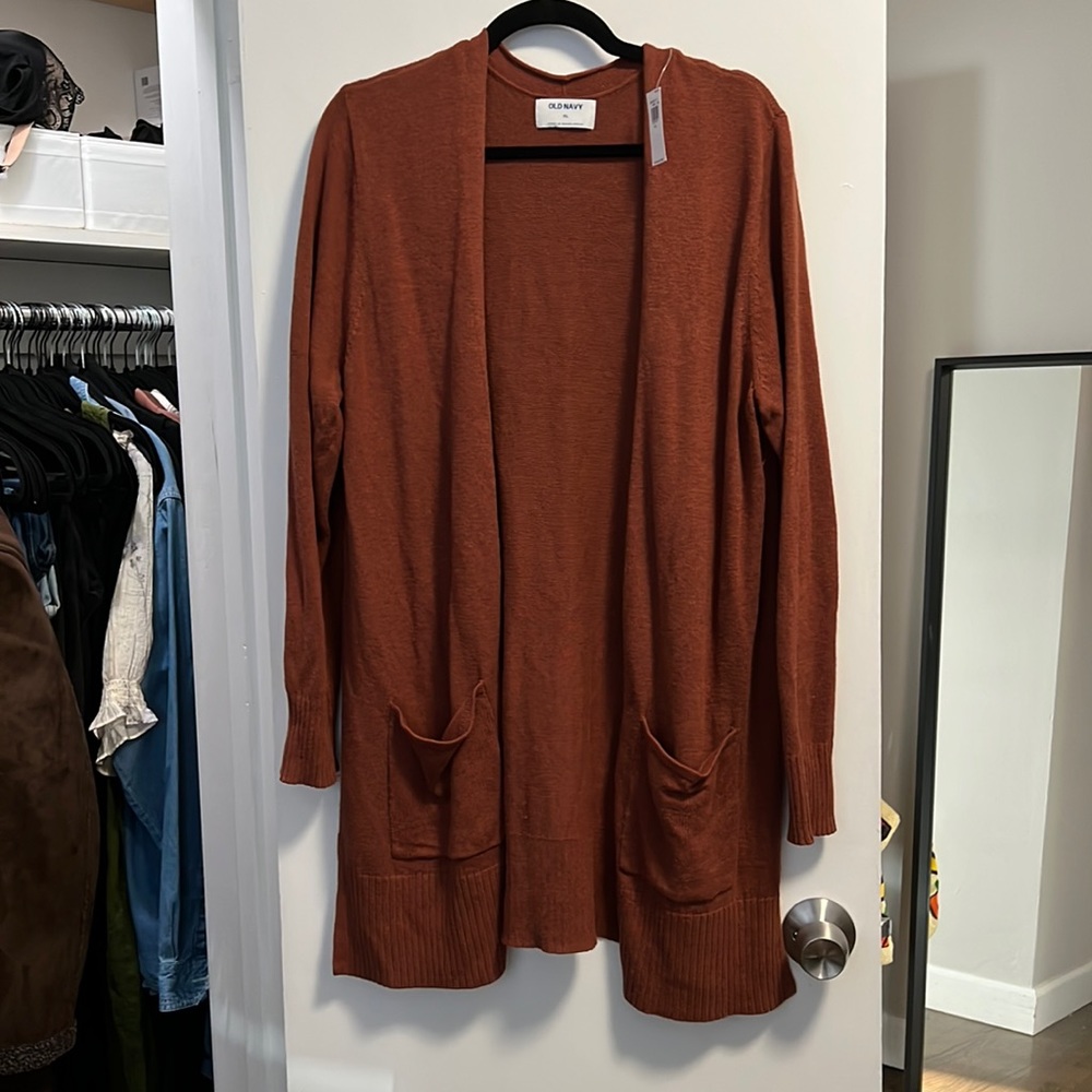 Long rust colored cardigan with pockets